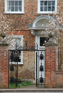 How grand is this gorgeous Georgian property, framed with a confetti of delicately scented Magnolia I drive past this house every day. I love the gates and front door too.