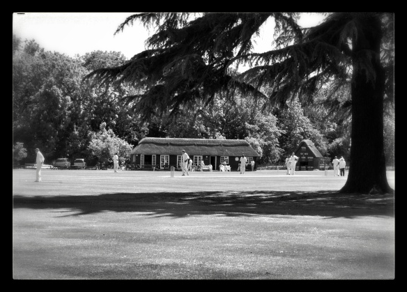 Southill village cricket pavillion, Southill Park estate and a very relaxing game of cricket taking place on the green. A lovely place to enjoy a cup of tea.